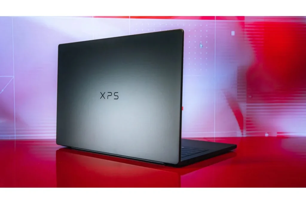 A rear-view shot of the high-end Dell XPS 14 in a studio setting, demonstrating the premium build quality of the Best Student Laptops.